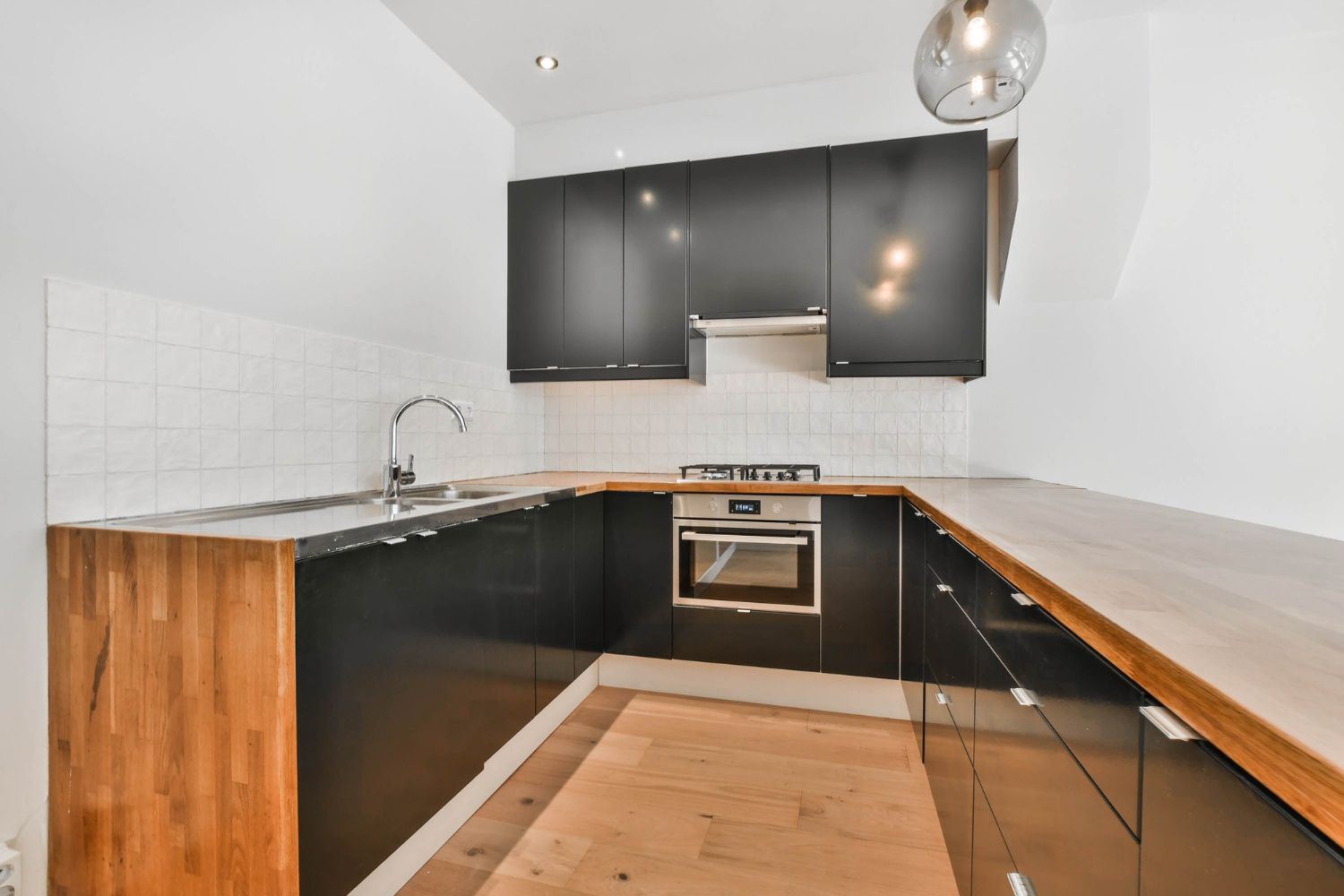 Custom cabinetry installation with a wood countertop