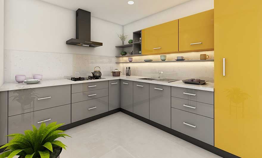 L-shaped kitchen with gray lower and yellow upper custom cabinets