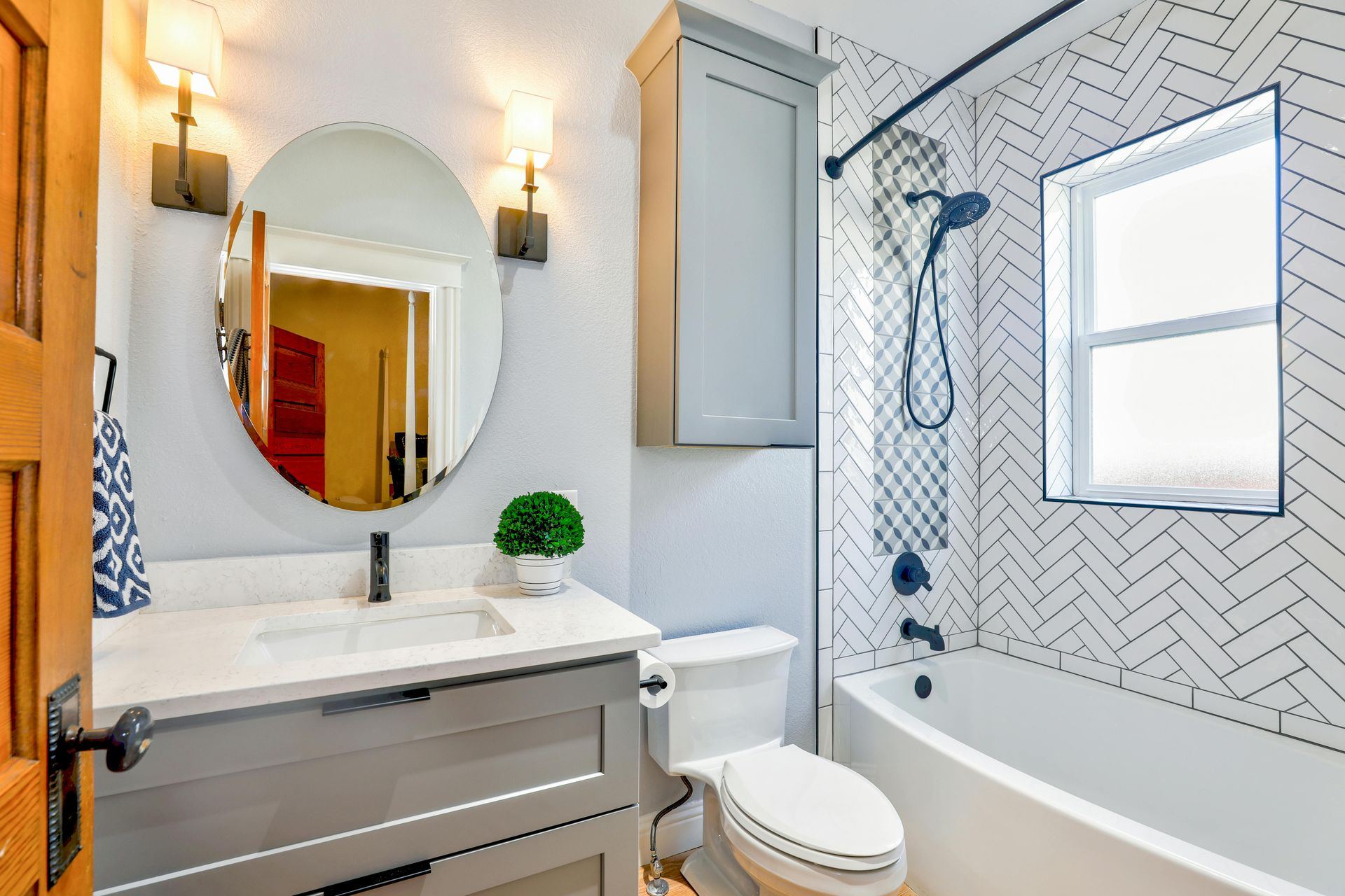 Custom powder room vanity with round mirror